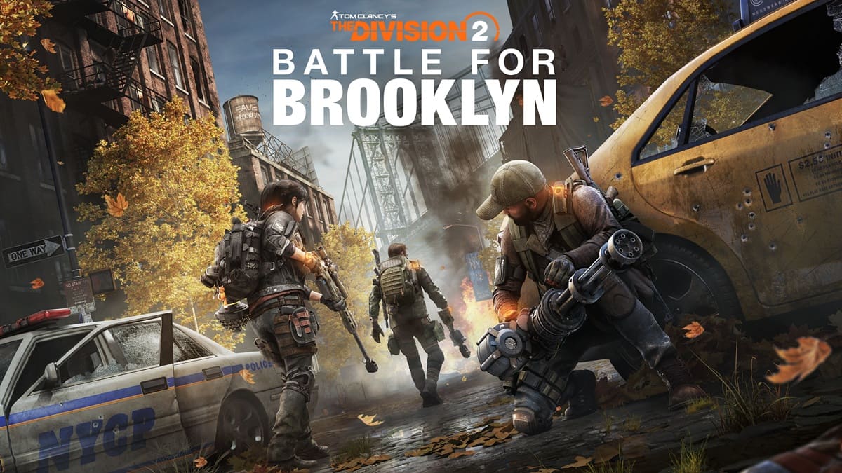 Portada de Tom Clancy's The Division 2: Battle for Brooklyn, con soldados armados avanzando por una calle destruida de Nueva York, rodeados de edificios y vehículos abandonados.